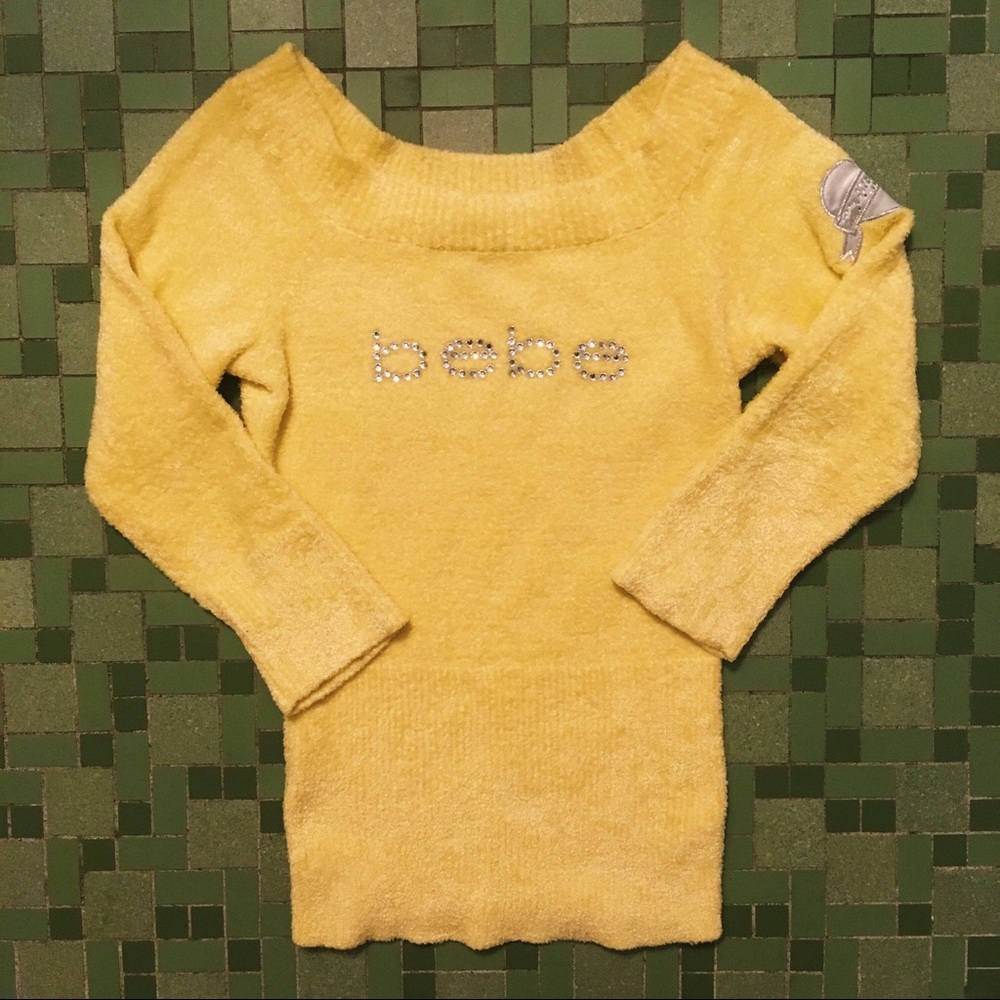 fuzzy pastel yellow bebe logo top